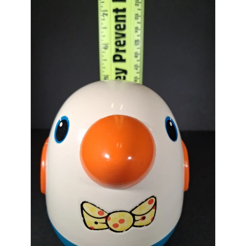 Vintage Playskool Roly Poly Chime Bird Toy Blue White Orange Bowtie Wobble